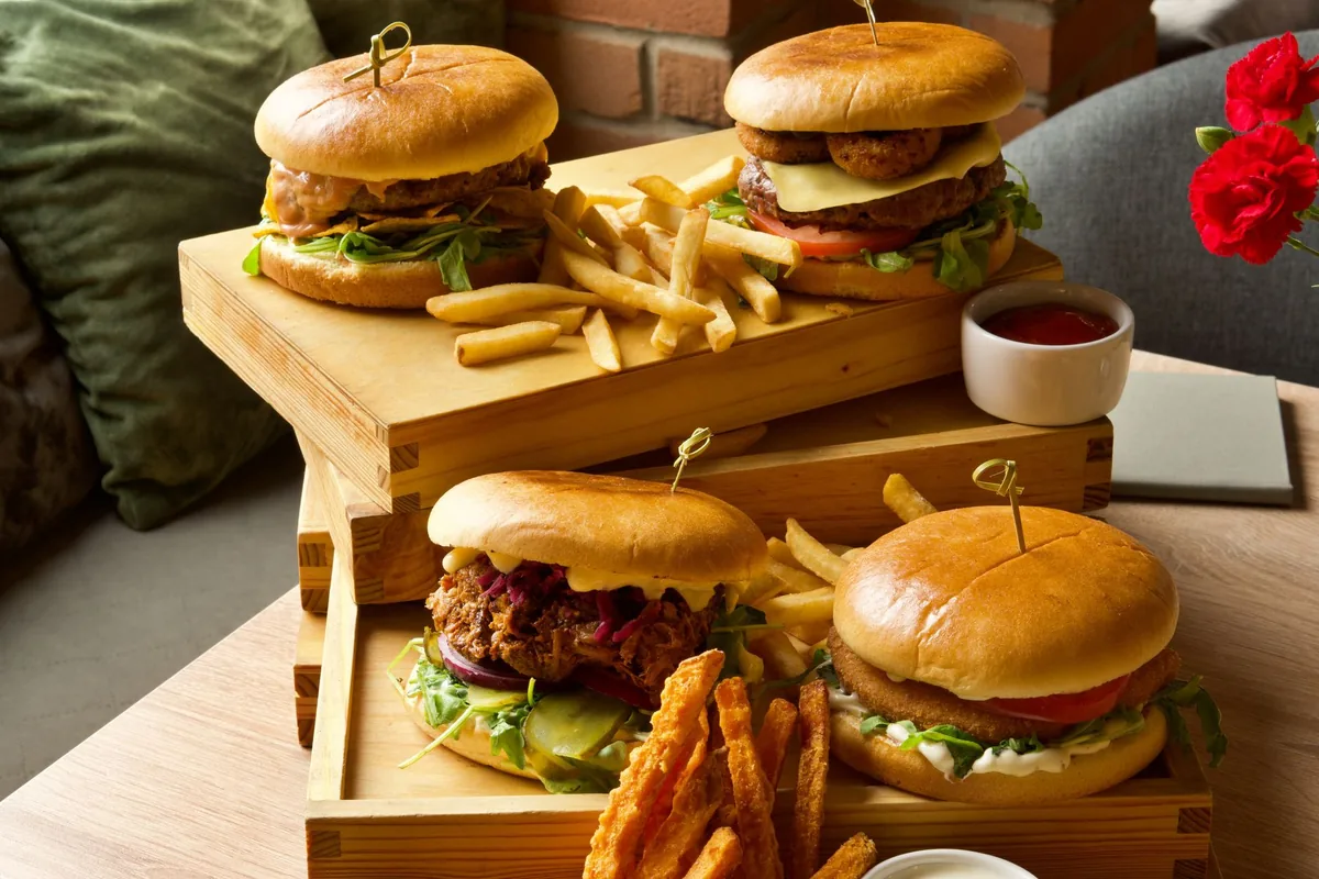 gourmet burger and fries room service tray