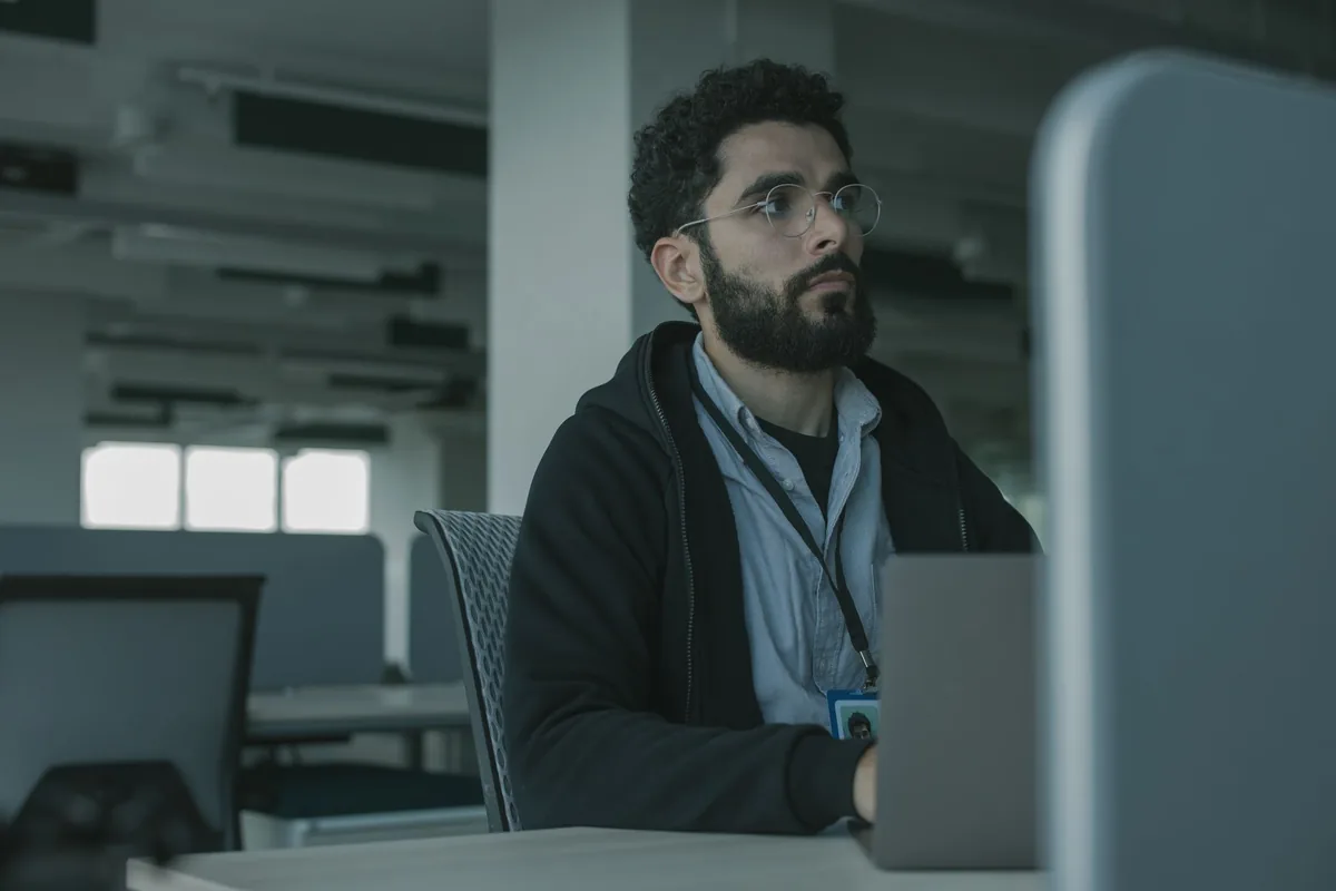 corporate office worker using laptop