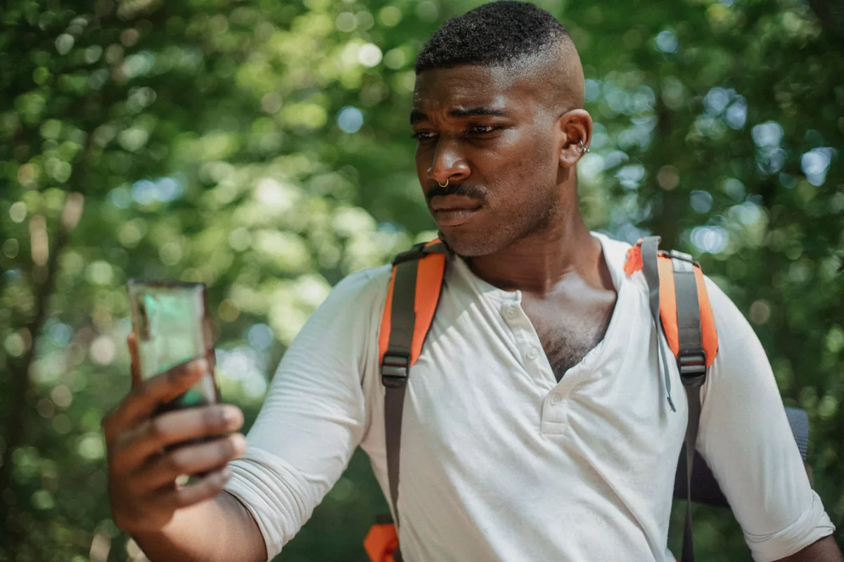 tourist using smartphone outdoors