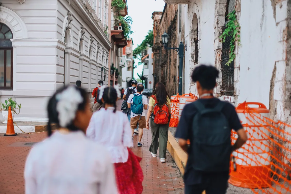 tourists walking historic city tour