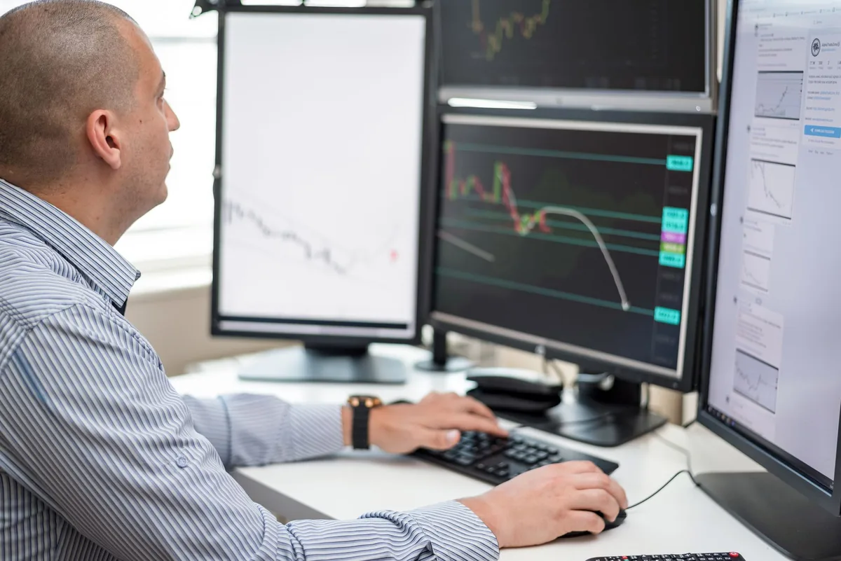 financial trading floor computer monitors