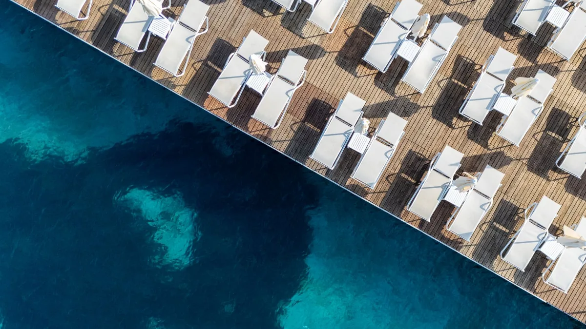 hotel destination pool deck waterfront