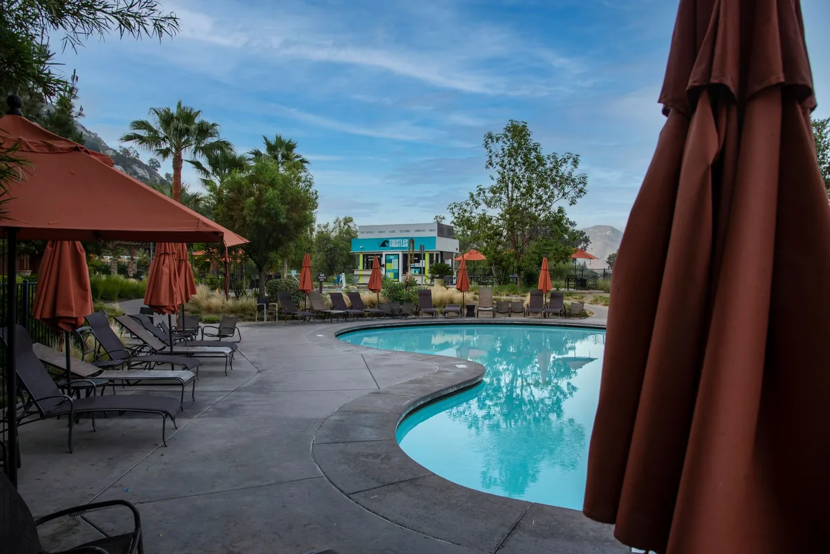 hotel outdoor swimming pool patio fire pit