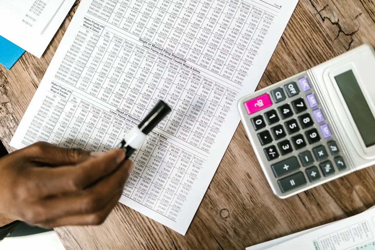 hotel accountant reviewing financial spreadsheet