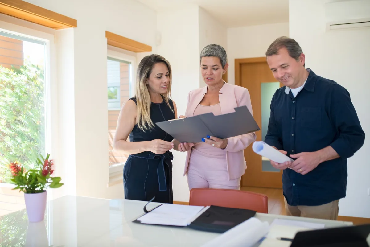 business professional reviewing real estate documents