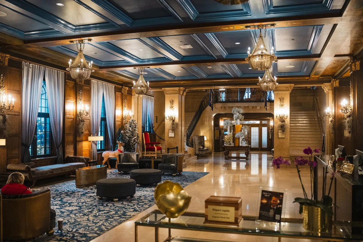 hotel lobby with sophisticated modern interior design and historic architectural details
