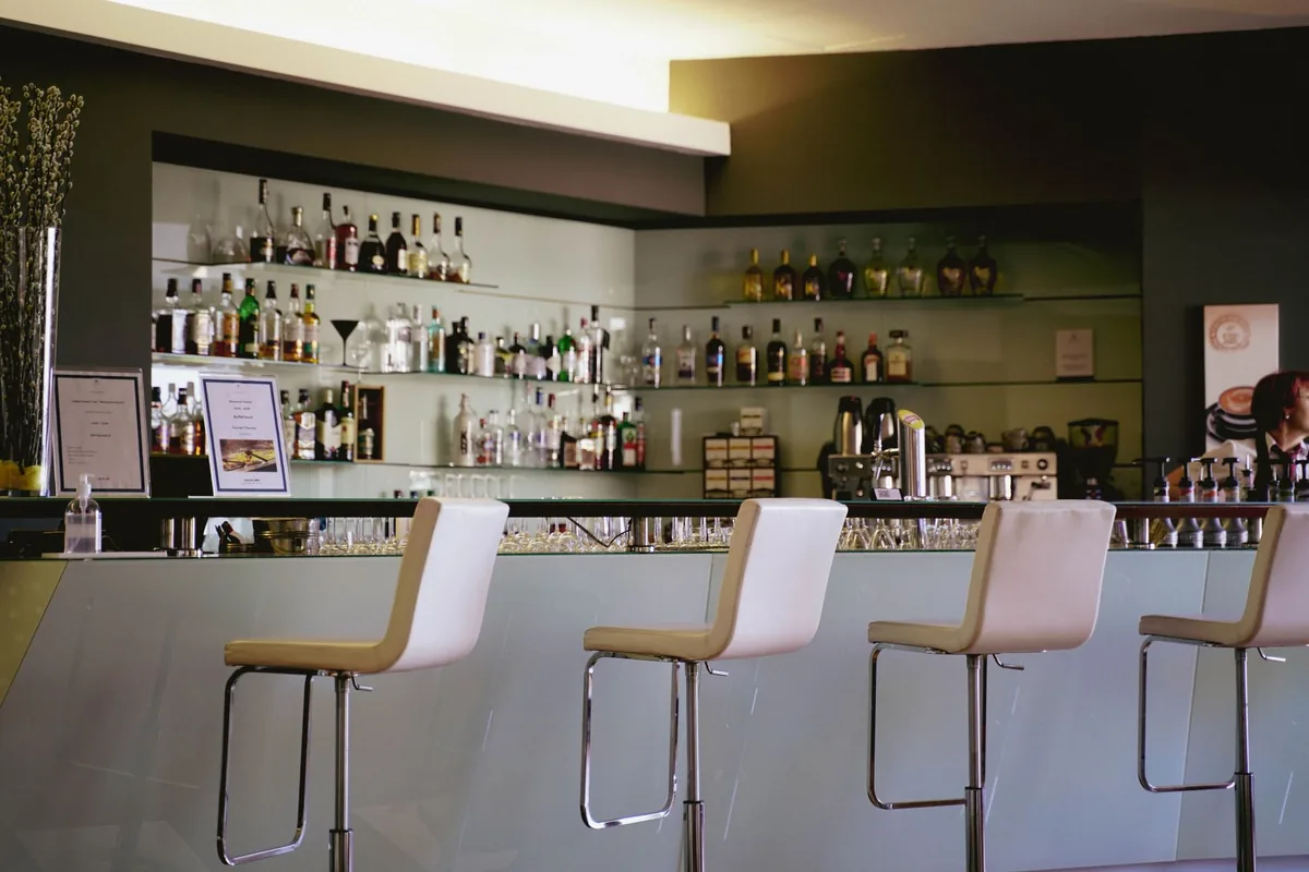 hotel restaurant interior with modern seating and bar area