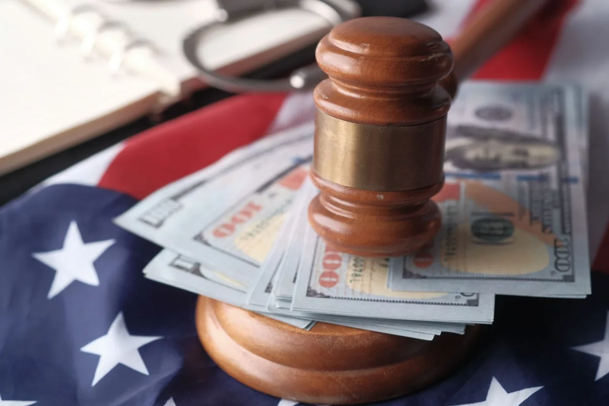DOJ Sues Hotel Operators Over Alleged $100M Fraud