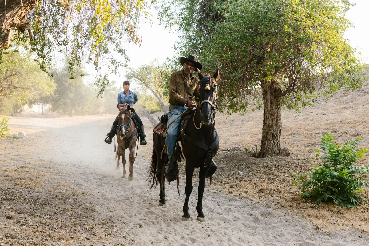 horseback riding on a wooded nature trail