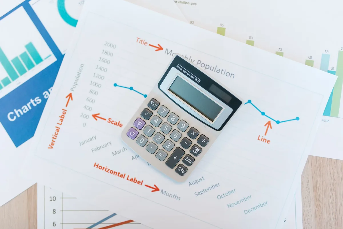 financial charts and graphs on a desk