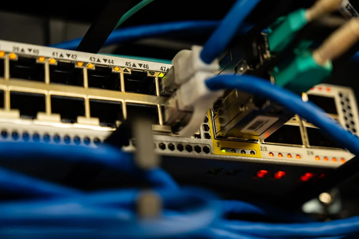 close up of network cables plugged into a router