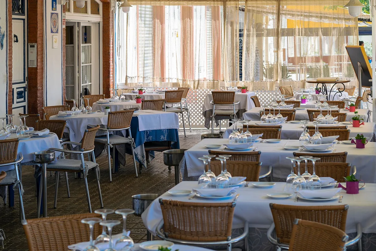 coastal themed restaurant dining room with Mediterranean decor