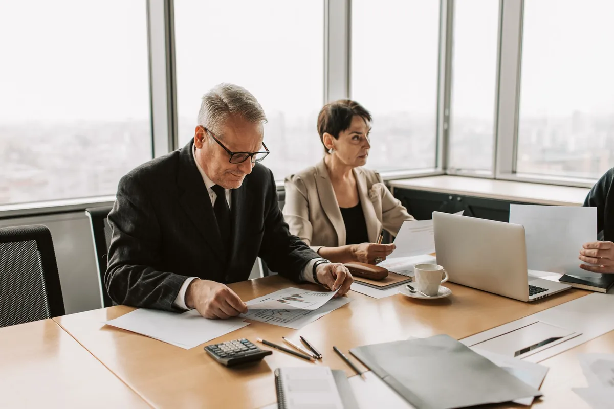 business executives meeting conference room table