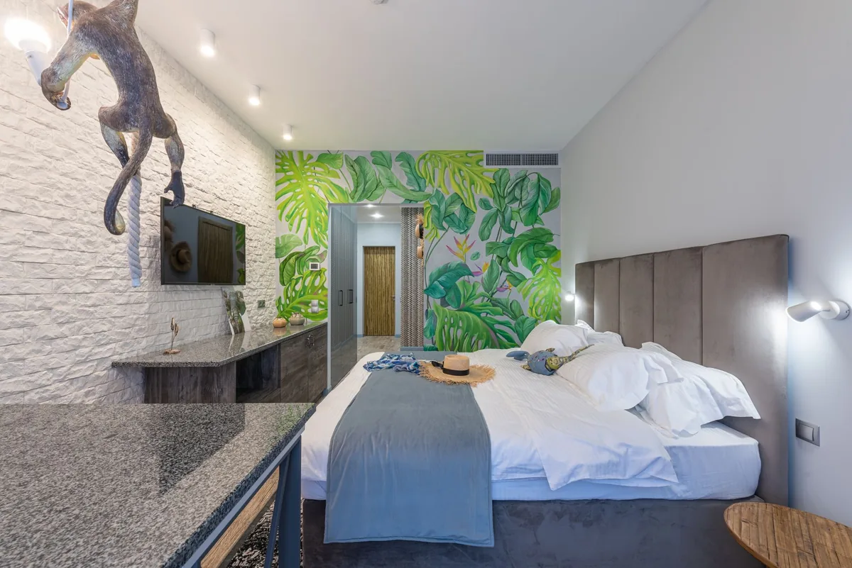 hotel bedroom with kitchen countertop