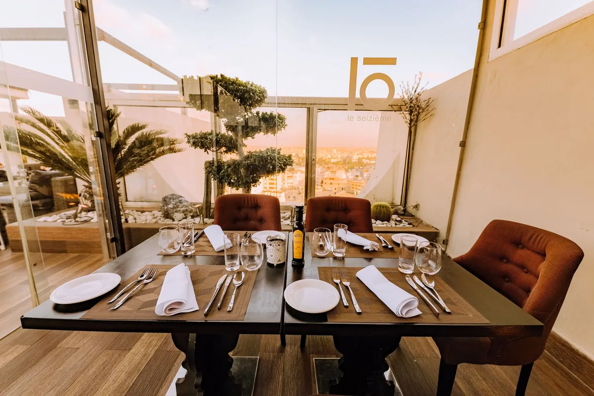 fine dining restaurant interior with city views