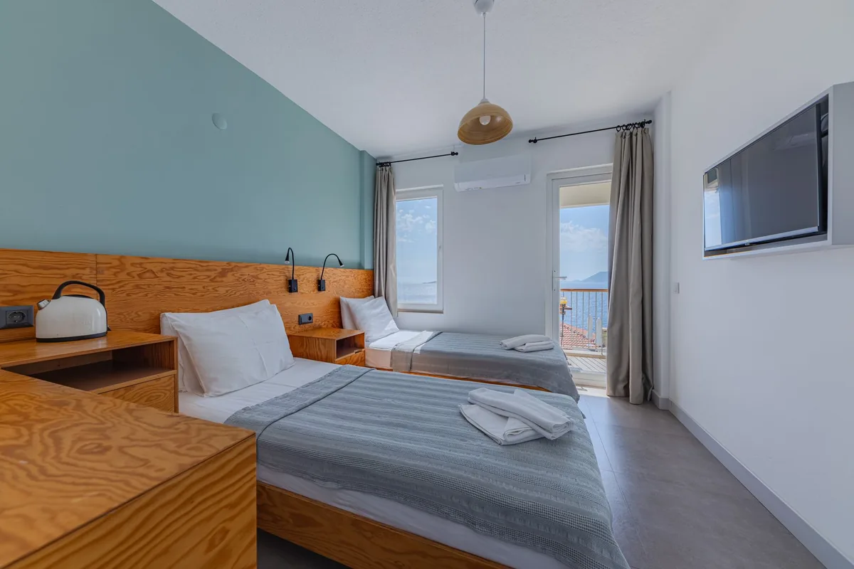 hotel room interior with modern furniture and fresh linens