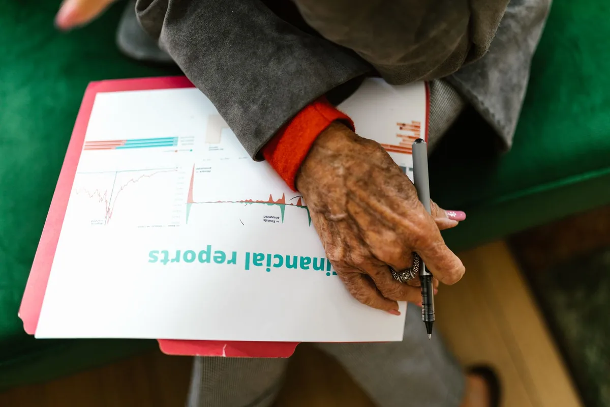 hotel manager reviewing spreadsheet documents