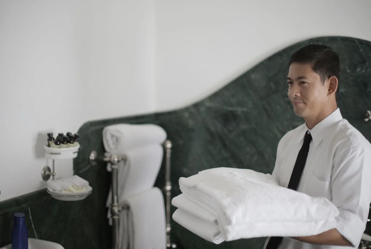 hotel staff uniform grooming inspection