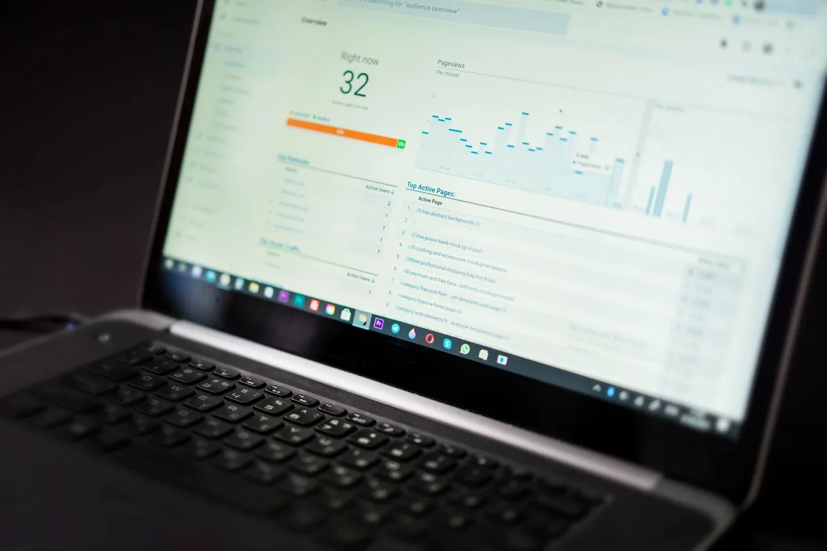 close up of a computer monitor displaying website analytics and falling traffic charts