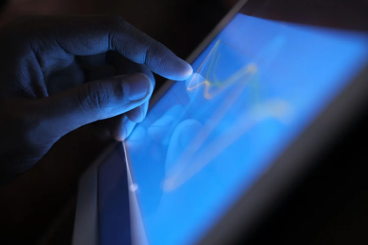 traveler using tablet computer