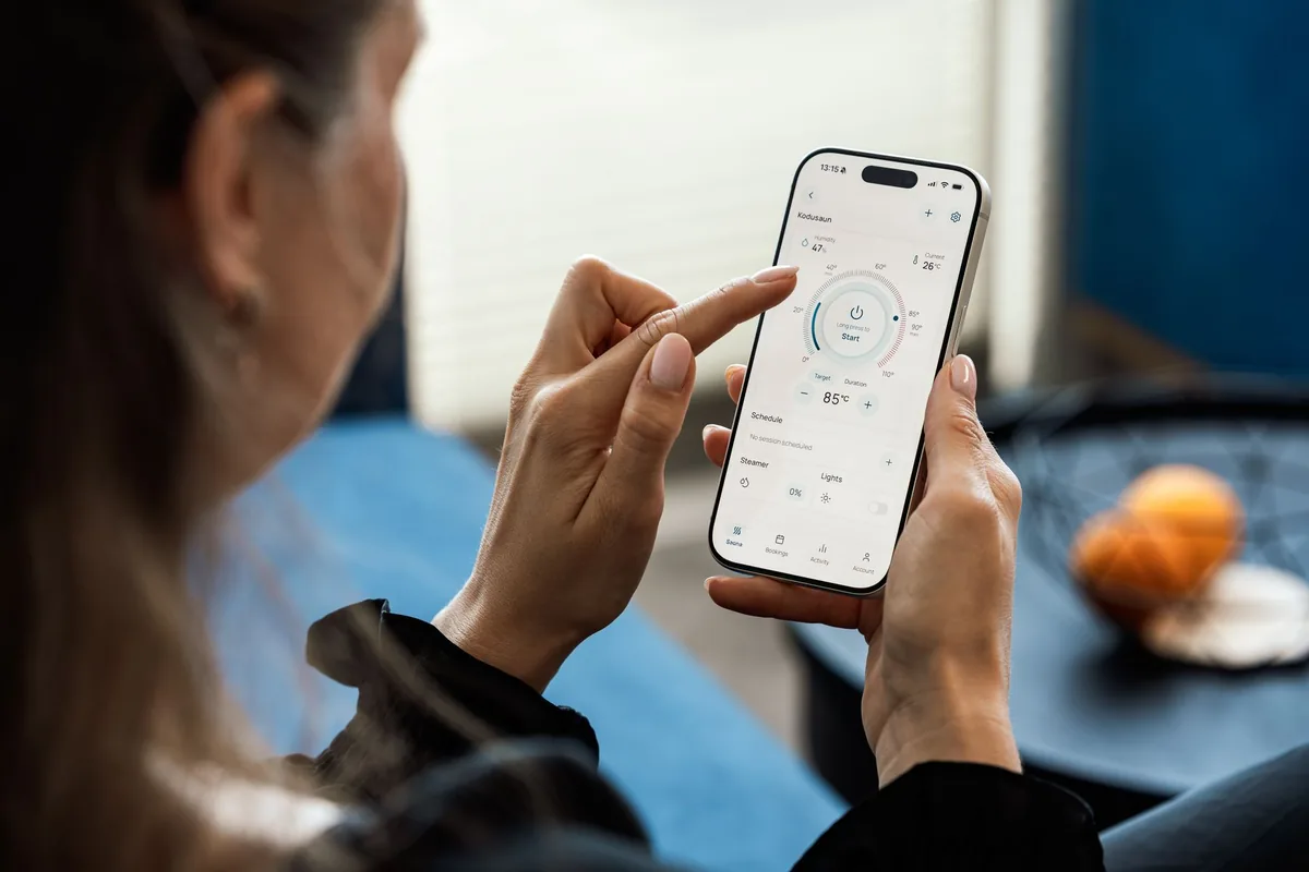 traveler booking hotel room smartphone app