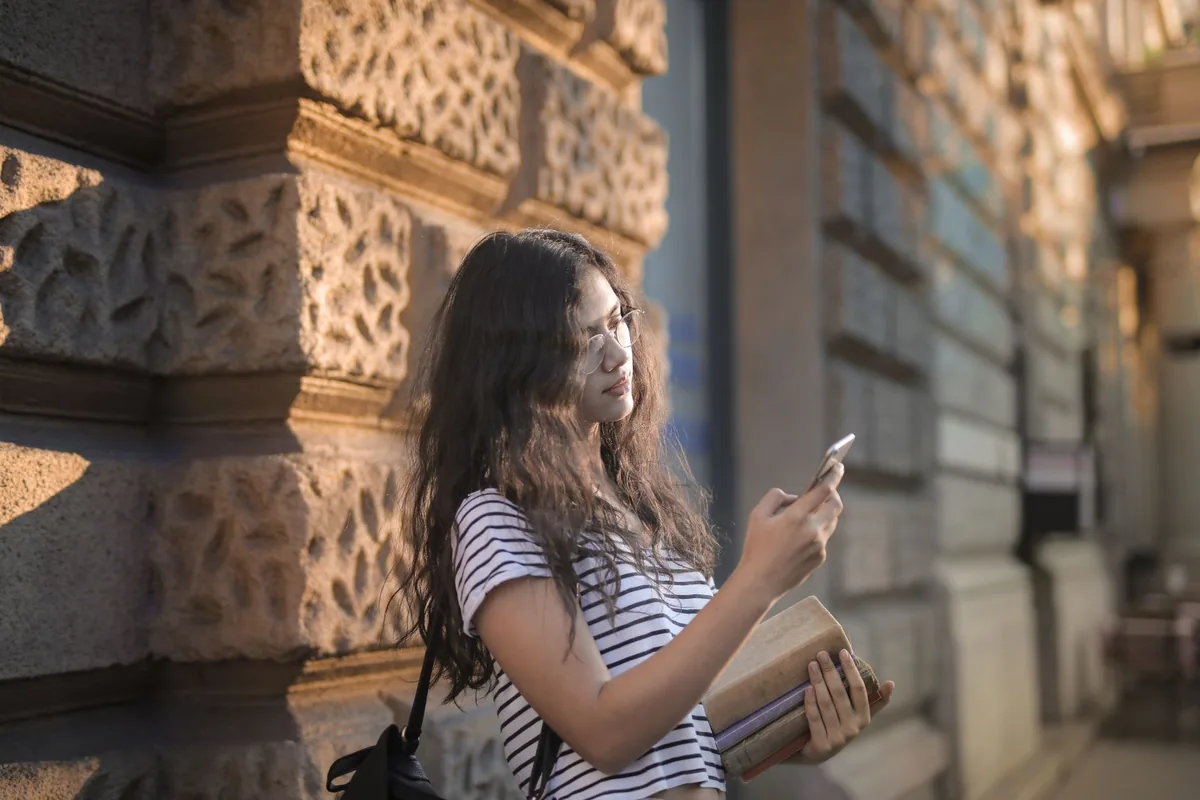 traveller using smartphone booking checkout