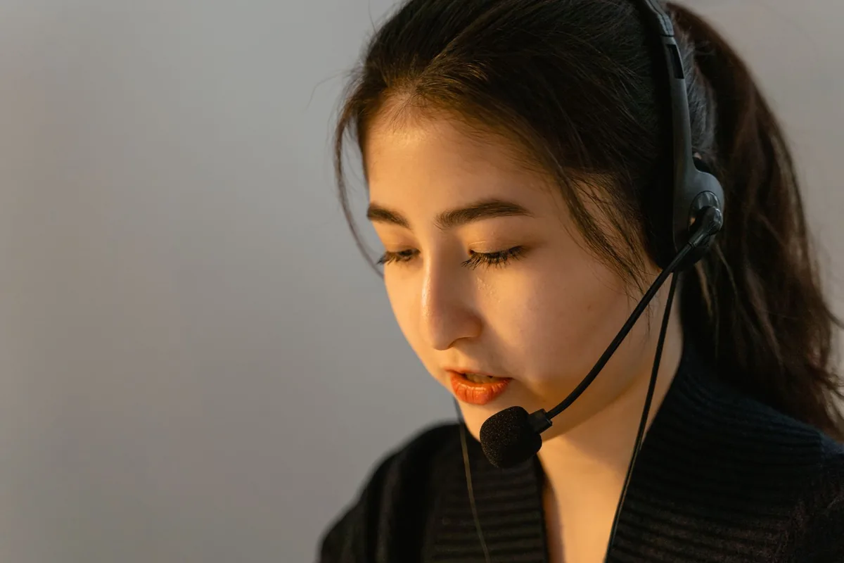 hotel telephone operator working with headset