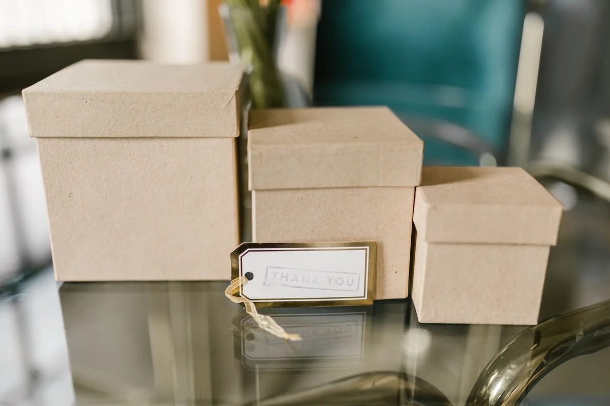 gift box amenities arranged on hotel suite table