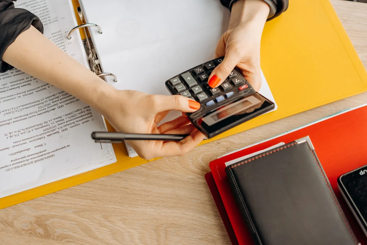 hotel financial documents calculator desk