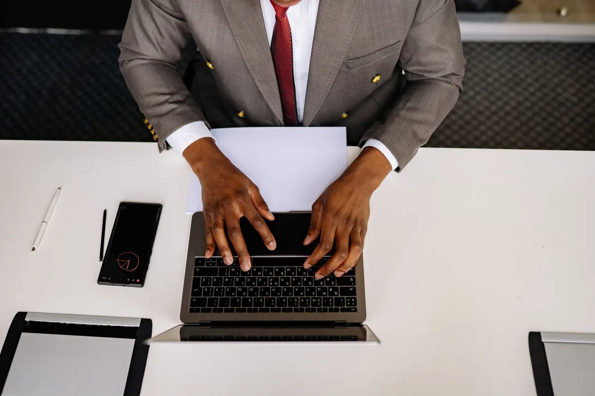 hotel manager working on laptop