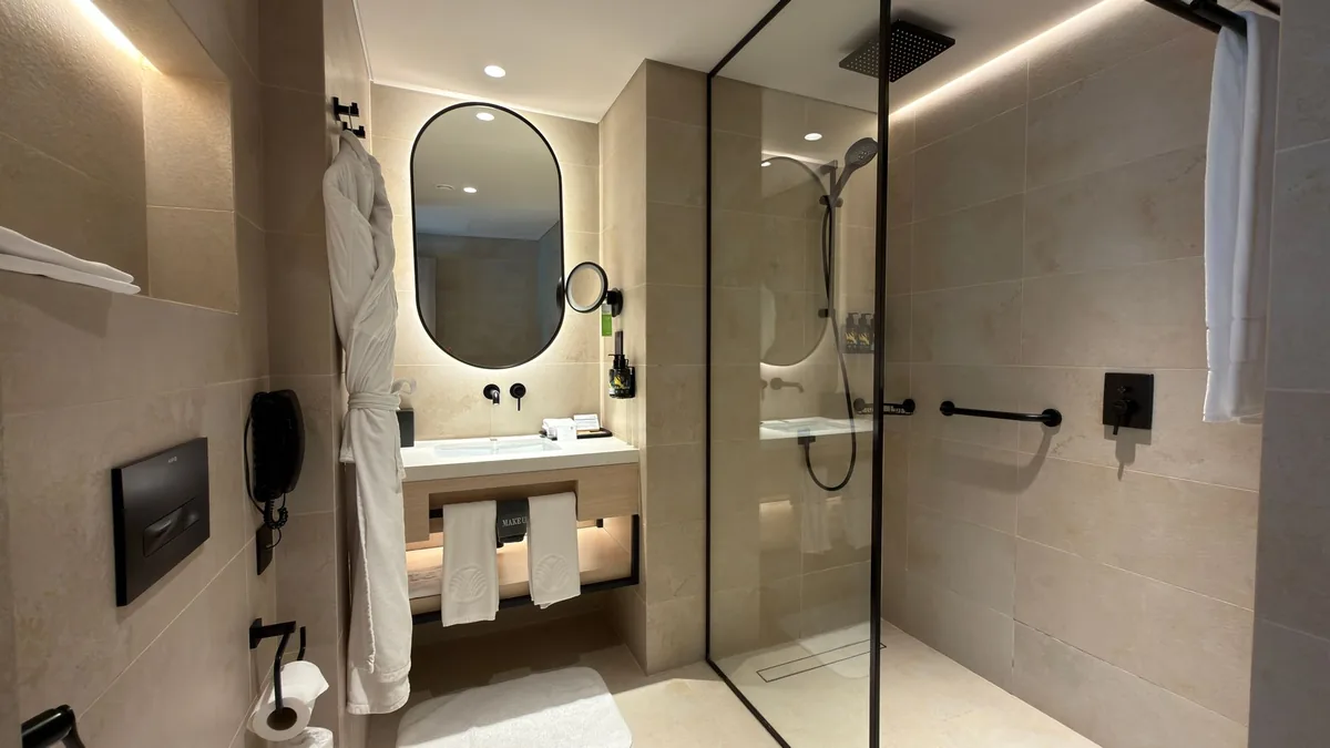 accessible hotel bathroom roll-in shower
