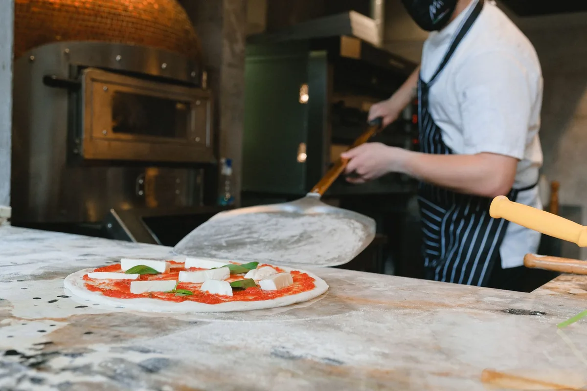 restaurant open kitchen pizza oven