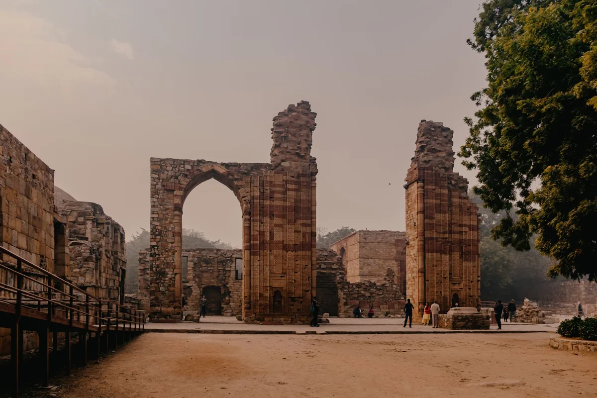 foreign tourists visiting a historic Indian heritage site