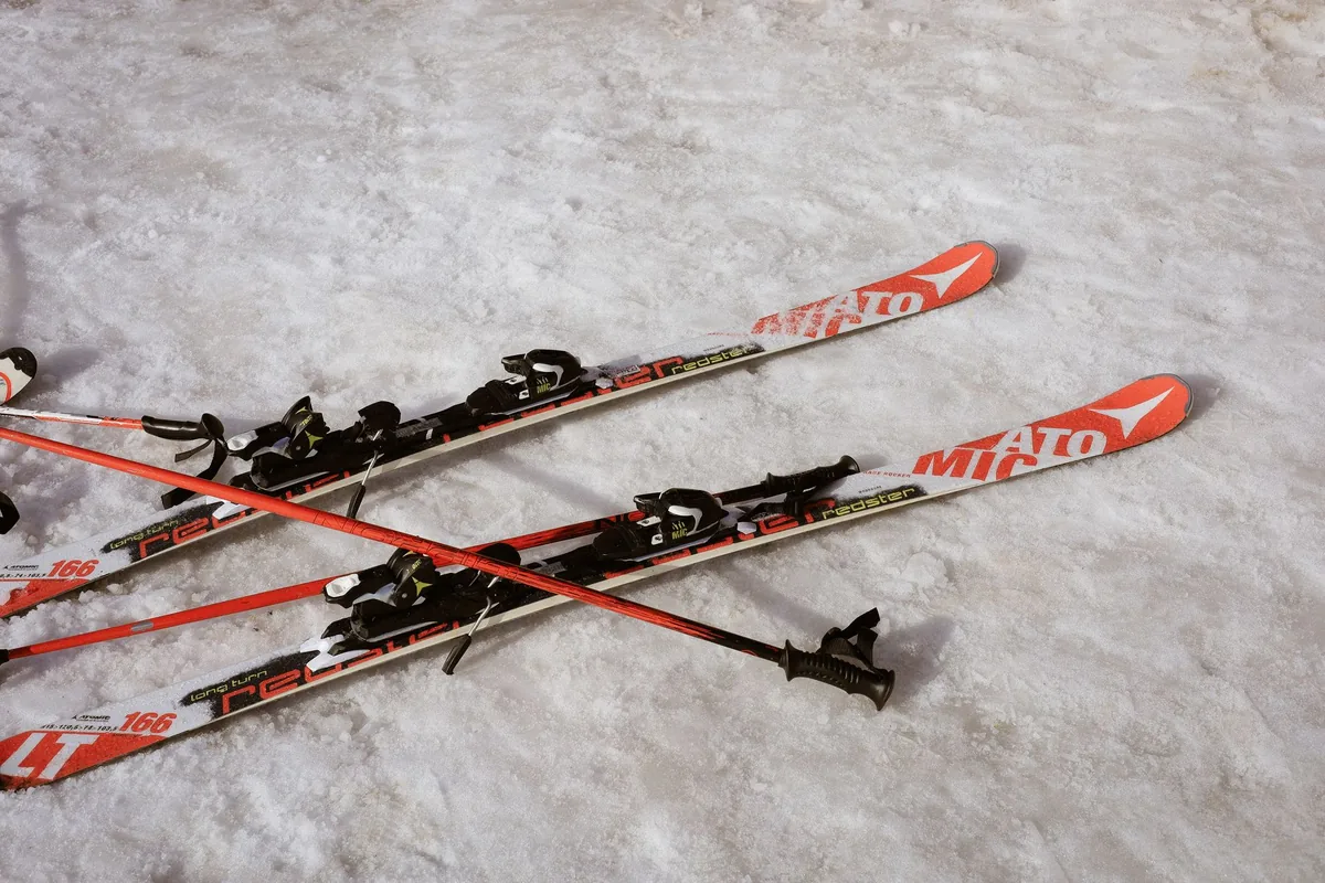 ski-in ski-out hotel entrance with skis