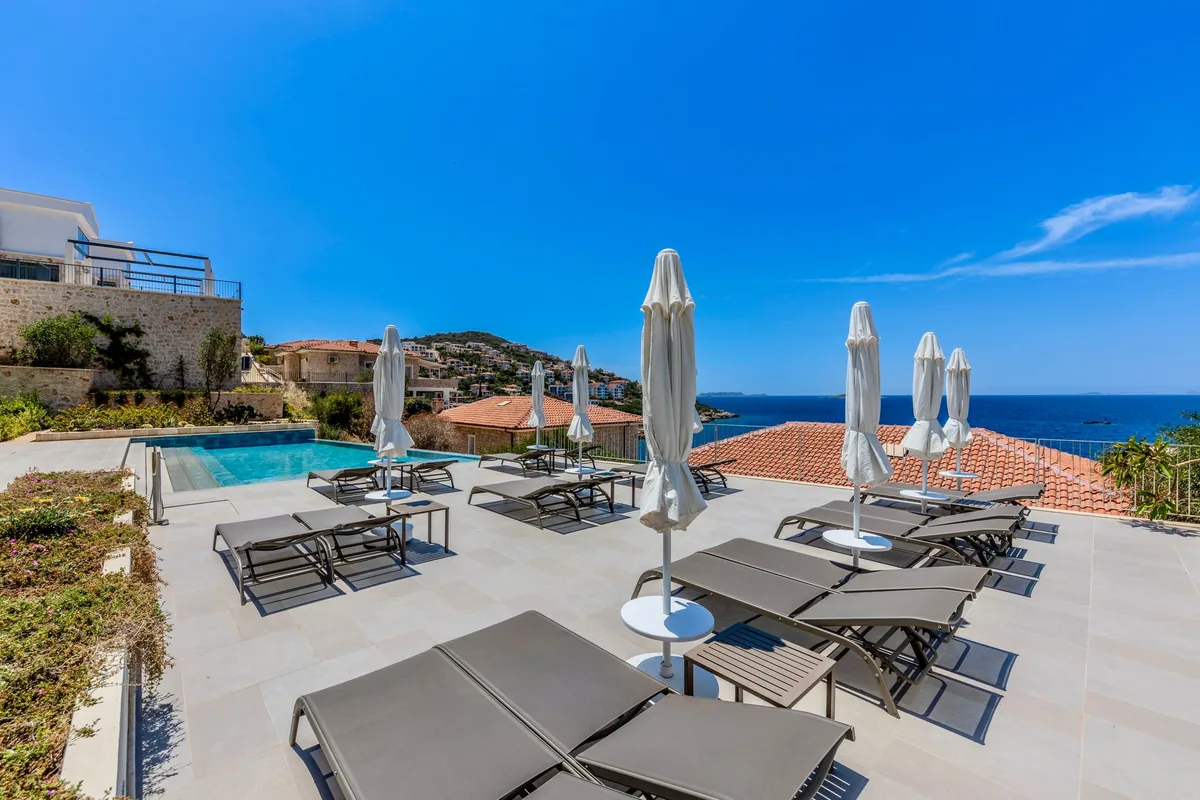 hotel swimming pool sun terrace loungers