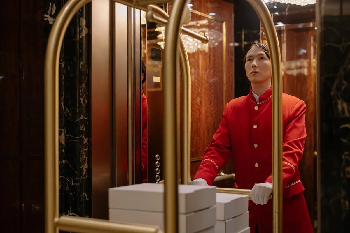 hotel bellman luggage cart lobby
