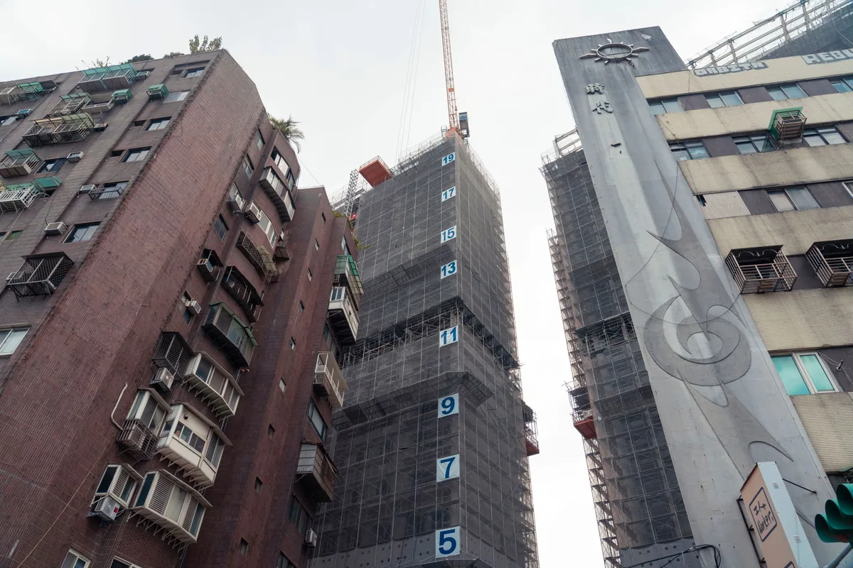 modern skyscraper construction site city