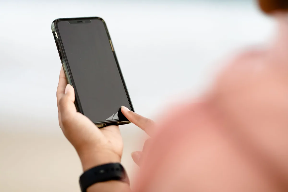 traveler using modern smartphone