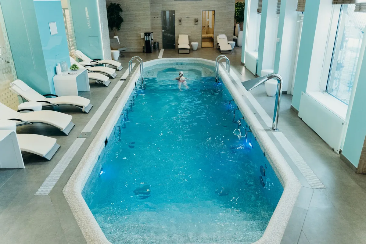 modern hotel indoor swimming pool spa