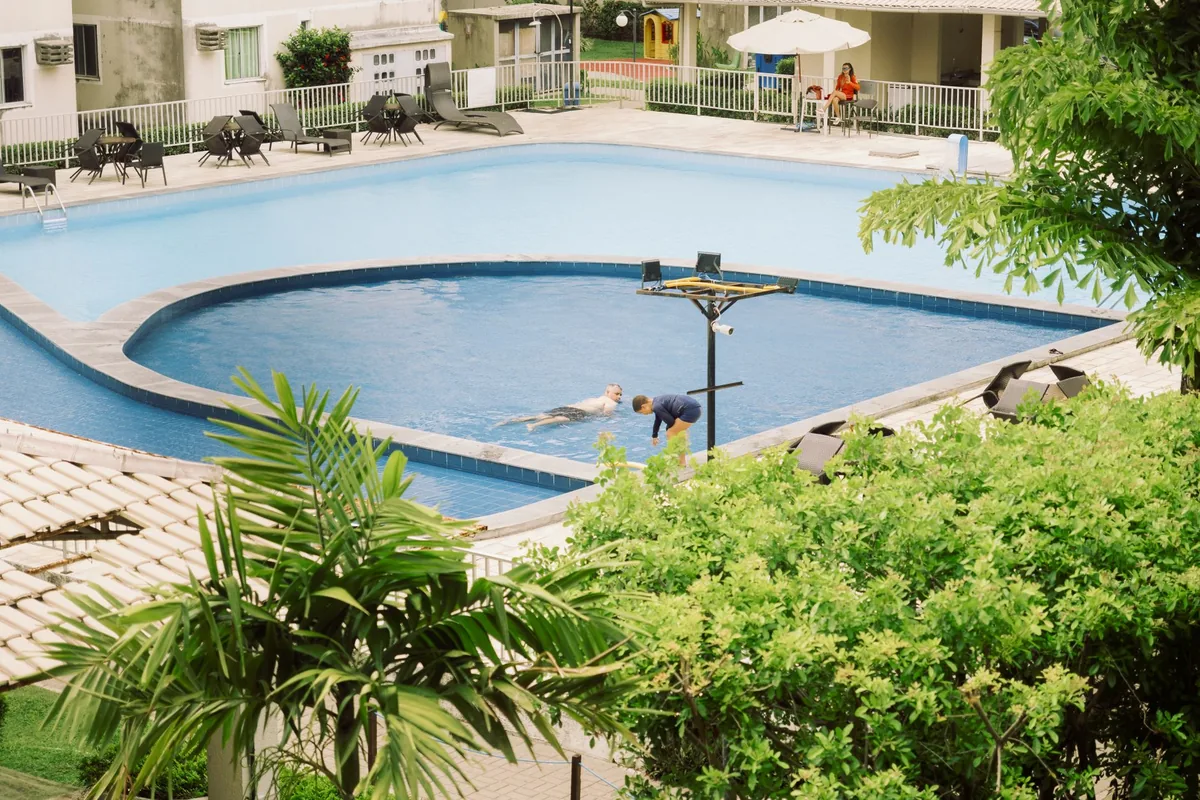 outdoor hotel swimming pool and padel courts