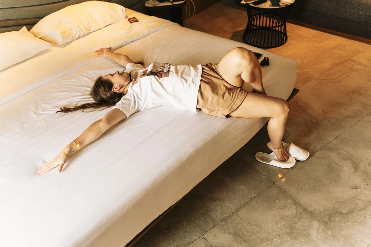 hotel guest doing morning stretch in room