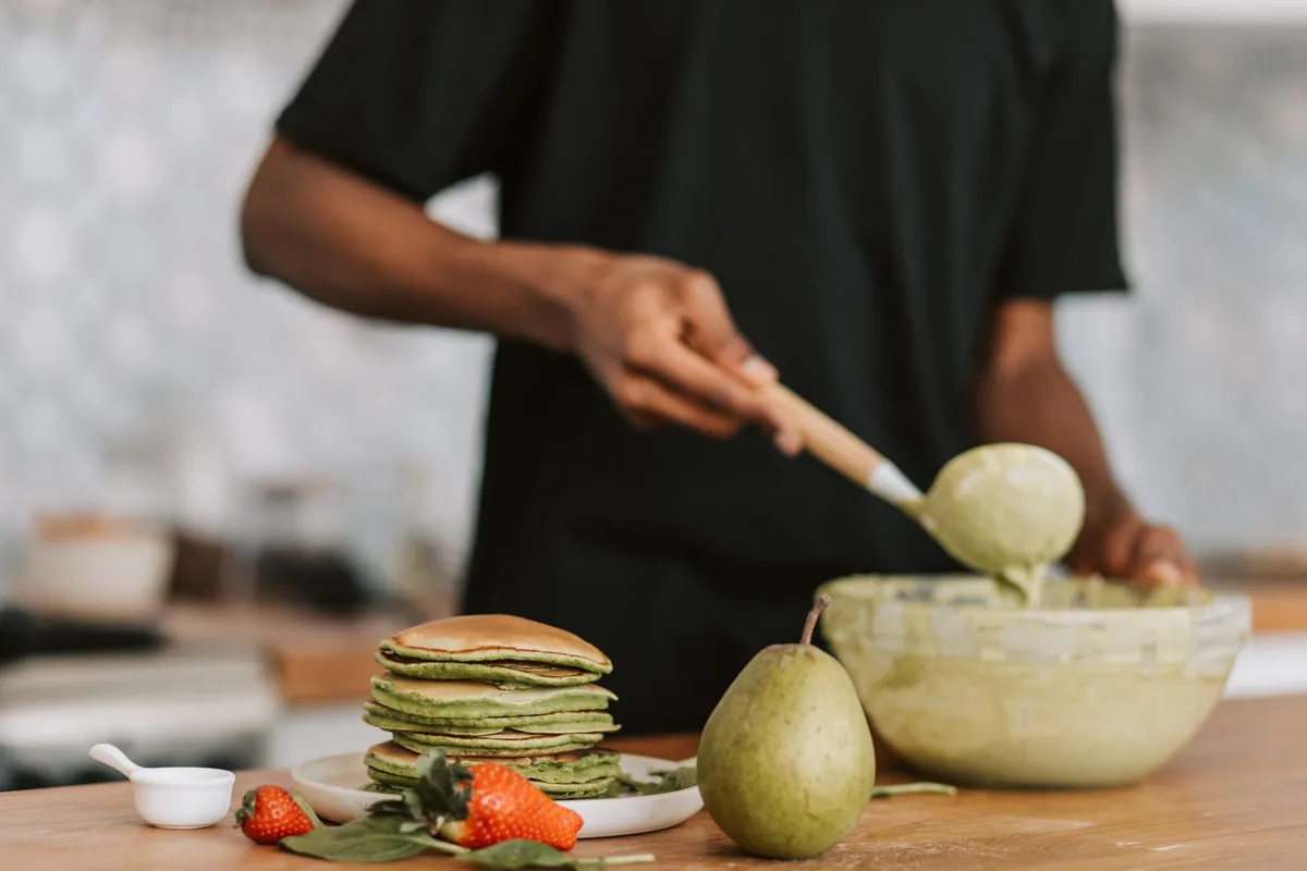 hotel chef preparing plant-based dish