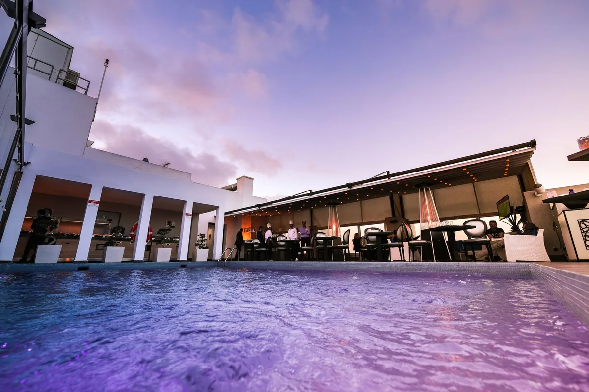 rooftop hotel restaurant patio with soft seating