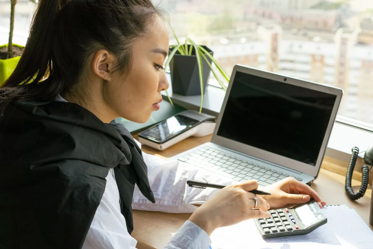accountant working on computer spreadsheets