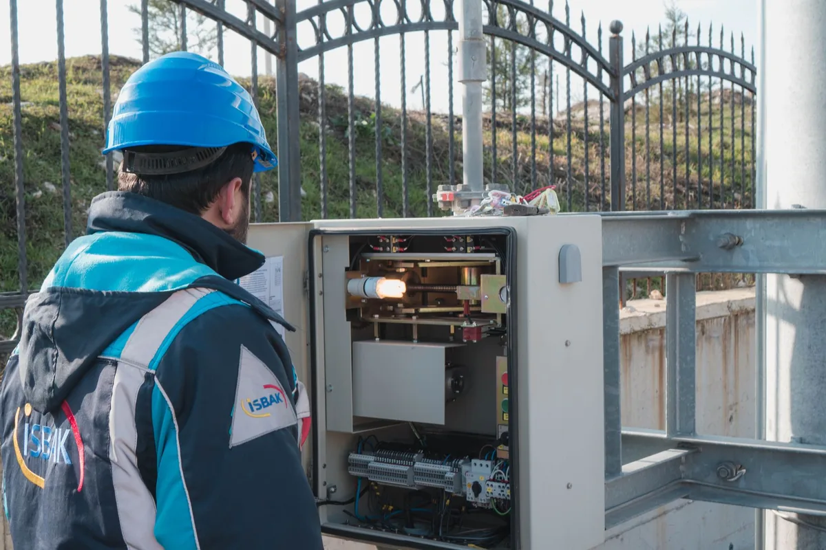technician inspecting commercial kitchen equipment