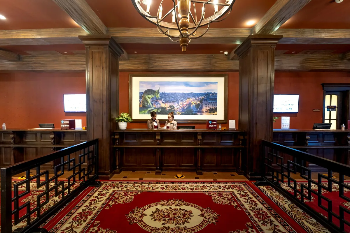 modern hotel lobby with check in desk and seating area