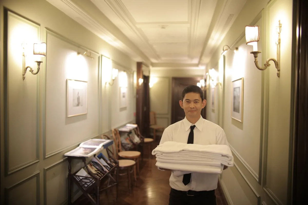 hotel housekeeping cart in modern corridor