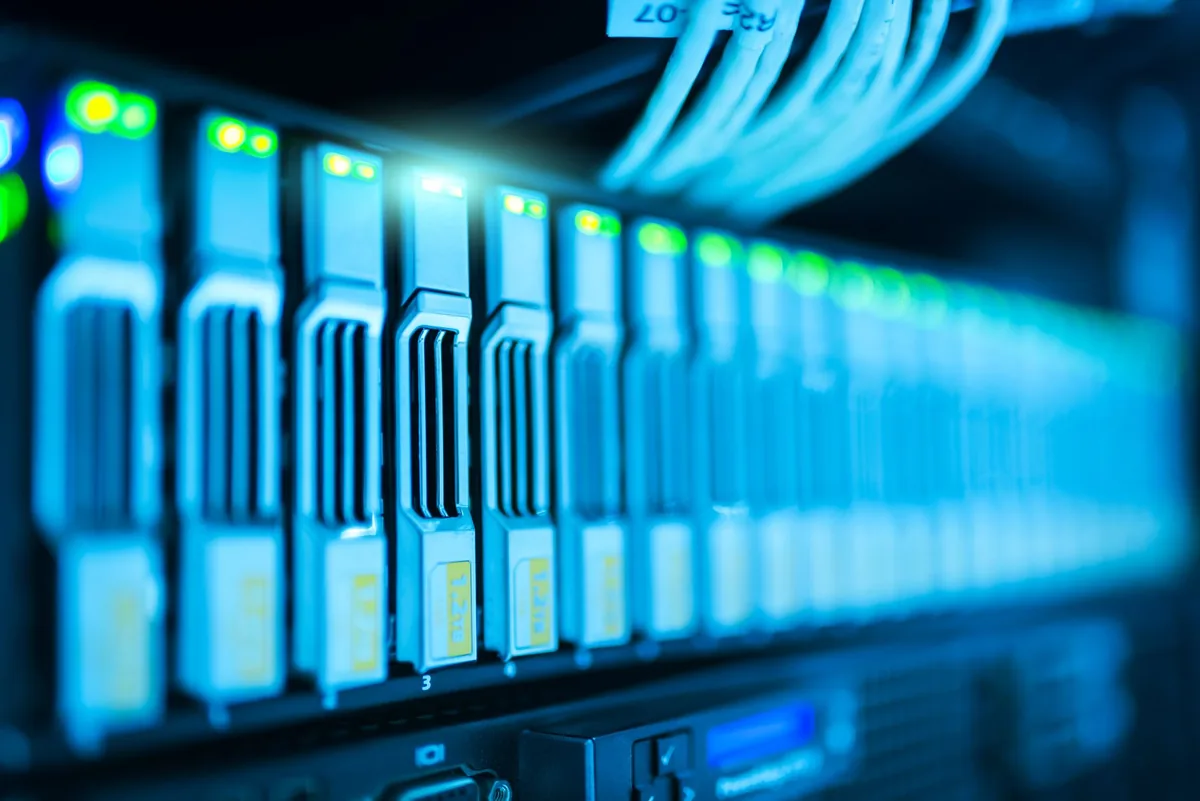 server racks and glowing data cables in a modern data center