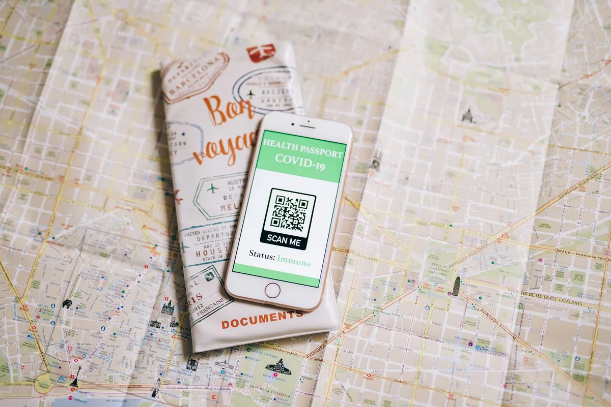 tourist scanning qr code phone