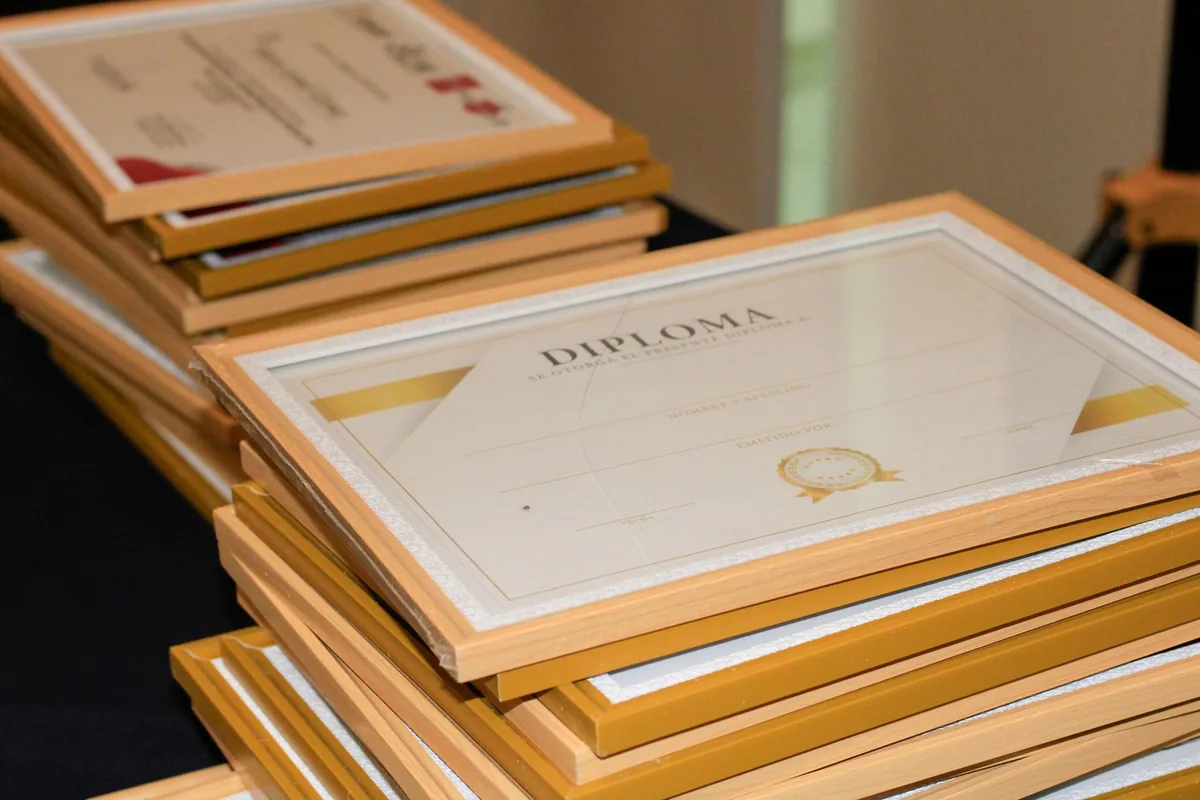 hotel executive holding an award certificate